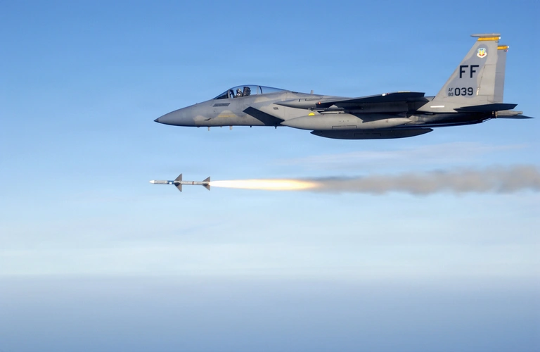 OVER THE GULF OF MEXICO -- First Lt. Charles Schuck fires an AIM-7 Sparrow medium range air-to-air missile from an F-15 Eagle here while supporting a Combat Archer air-to-air weapons system evaluation