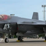 ighter aircraft equipped with AMRAAM missile launchers during operational deployment