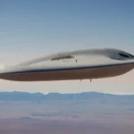 The Northrop Grumman B-21 Raider stealth bomber during a flight test maneuver.