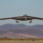 U.S. Air Force B-21 Raider stealth bomber conducting flight testing at Edwards Air Force Base during accelerated development campaign