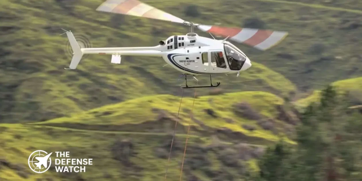 Bell 505 light helicopter in flight configured for military pilot training missions