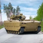 Export version of Poland’s Borsuk infantry fighting vehicle equipped with Turra 30 turret displayed at IDEB 2026 defense exhibition.