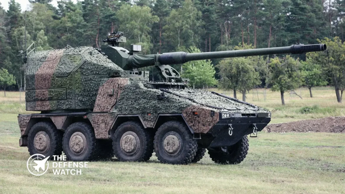 British Army RCH 155 wheeled artillery system mounted on Boxer armored vehicle during mobility and firing trials