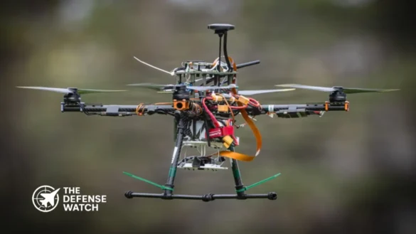 British Army armored unit coordinating with drones in live battlefield exercise