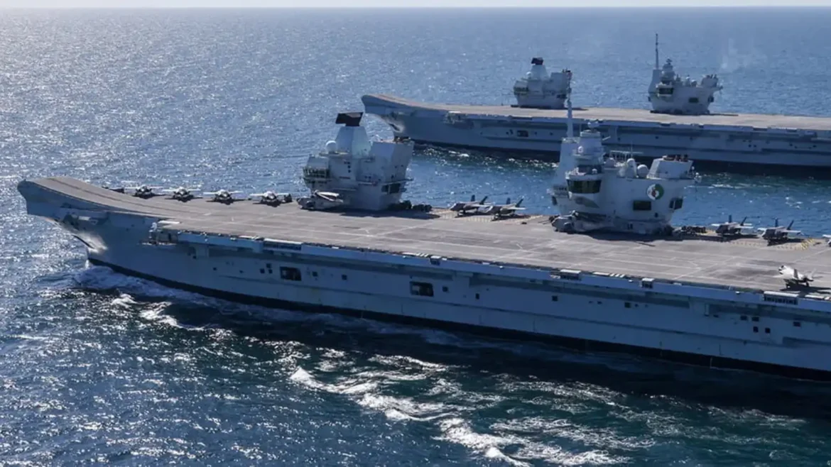 British aircraft carrier sailing in northern waters during NATO maritime operations near Norway