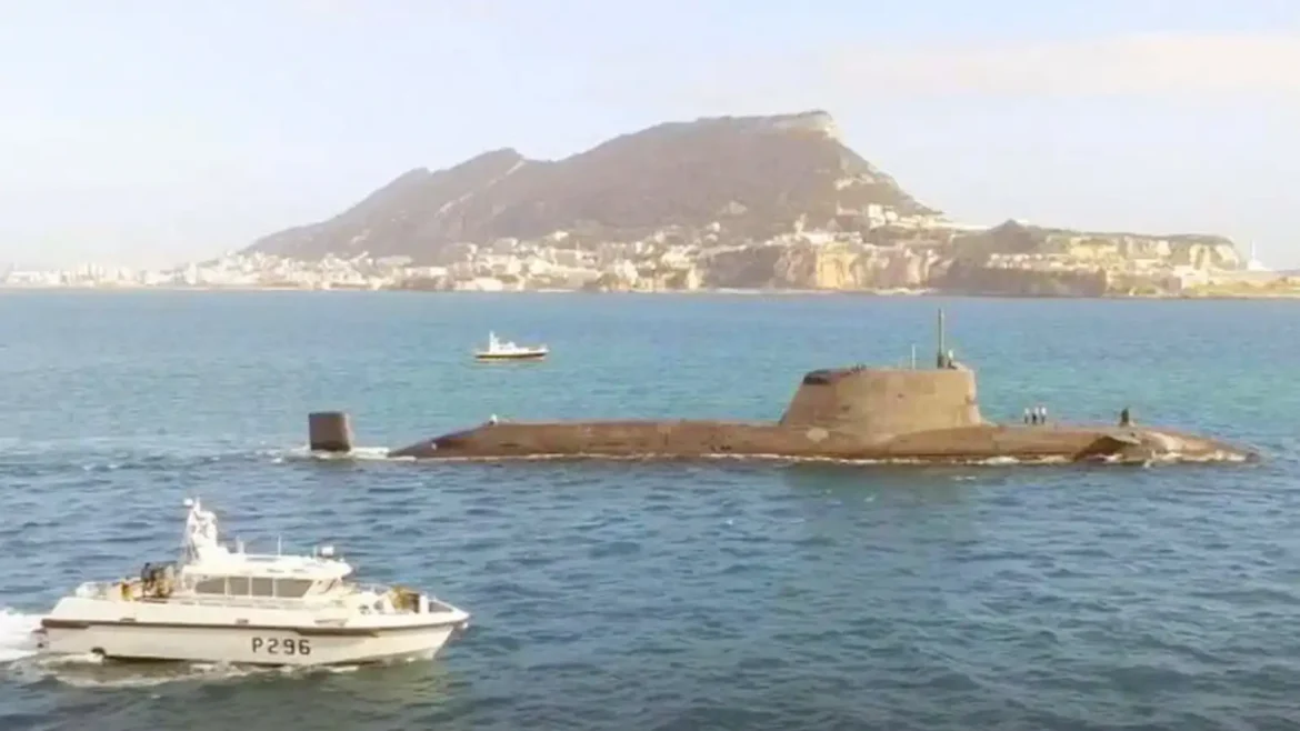 HMS Anson escorted into Gibraltar port with a small patrol vessel in proximity