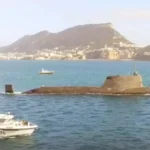 HMS Anson escorted into Gibraltar port with a small patrol vessel in proximity