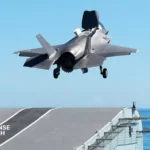 Aircraft carrier at sea with F35 jets on deck highlighting naval aviation logistics challenges
