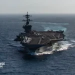 U.S. Navy aircraft carrier undergoing maintenance operations supported by Huntington Ingalls Industries engineering teams