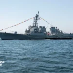U.S. Navy Arleigh Burke-class destroyer operating at sea equipped with Integrated Bridge Navigation System technology supplied by Northrop Grumman.