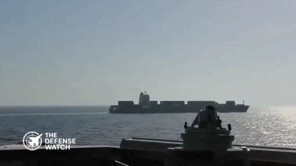 U.S. Navy guided-missile destroyer USS Spruance monitoring the disabled Iranian-flagged cargo vessel M/V Touska in the Arabian Sea following a maritime interdiction operation, April 2026.