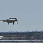 Northrop Grumman XRQ-73 SHEPARD hybrid electric uncrewed aircraft on runway at Edwards Air Force Base.
