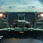 Oshkosh Defense eJLTV hybrid-electric tactical vehicle showcasing independent suspension and silent watch capability for military operations.