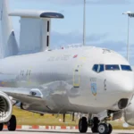 RAF E-7 Wedgetail WT001 aircraft landing at RAF Lossiemouth in Scotland during UK airborne surveillance modernization program