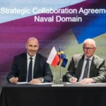 Saab and PGZ representatives signing naval cooperation agreement focused on submarines and underwater defense systems in Europe