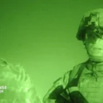 U.S. Army soldier wearing enhanced night vision goggles during nighttime combat training exercise