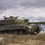 British Challenger 2 main battle tanks maneuver during Exercise Spring Storm in Estonia near NATO's eastern border.