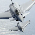 Eurofighter Typhoon equipped with ECRS Mk1 AESA radar during flight testing for Germany and Spain's fighter modernization programs.